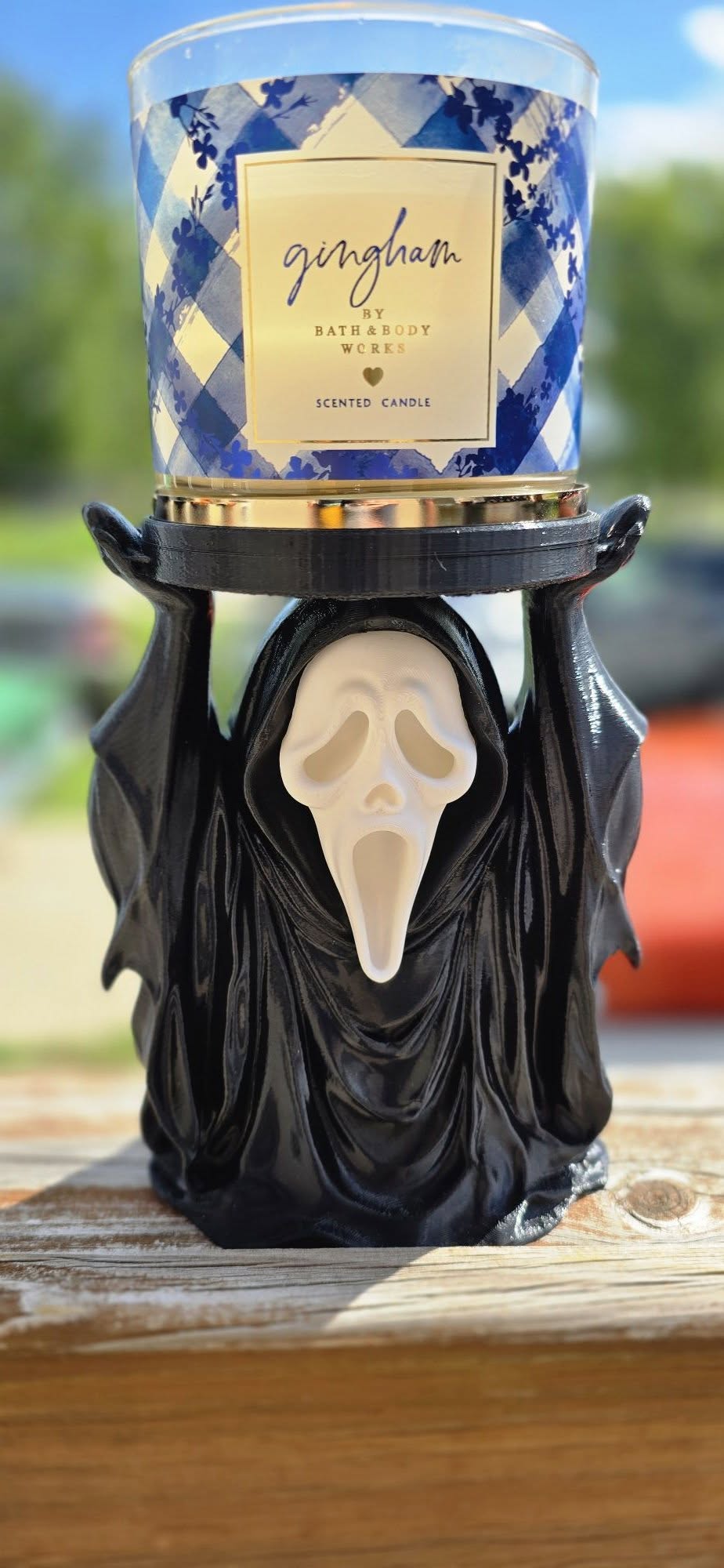 3D-printed robed phantom candle holder with pale screaming mask, horror movie inspired 3-wick candle stand