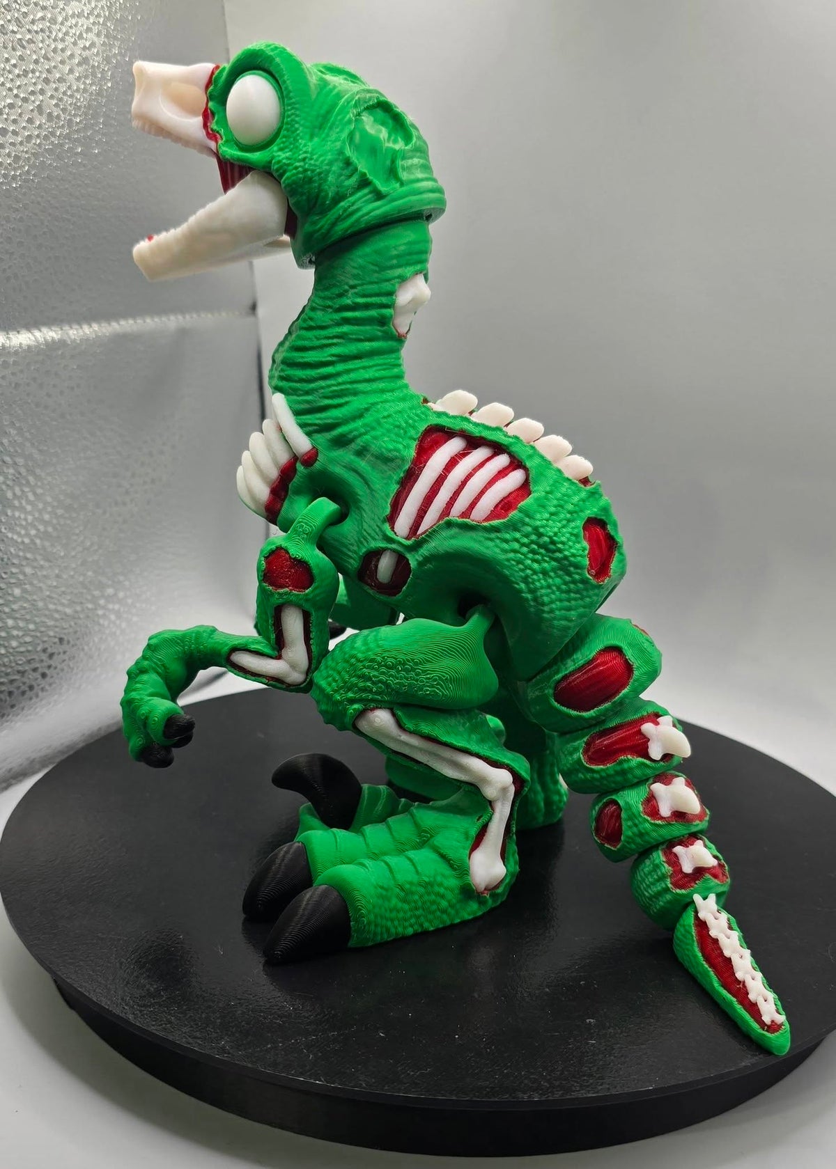 Zombie Raptor Figure — Exposed-Bone Dino Collectible